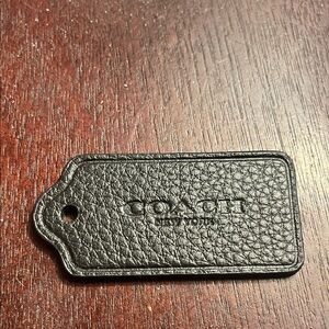 Coach Black Textured Leather Tag